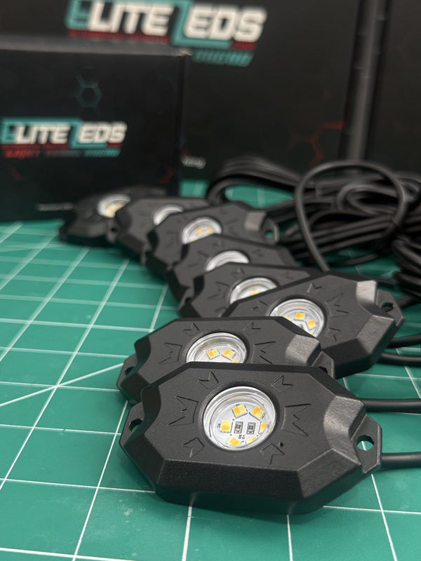 White rock light pods with Elite LEDs packaging showing die-cast aluminum housing