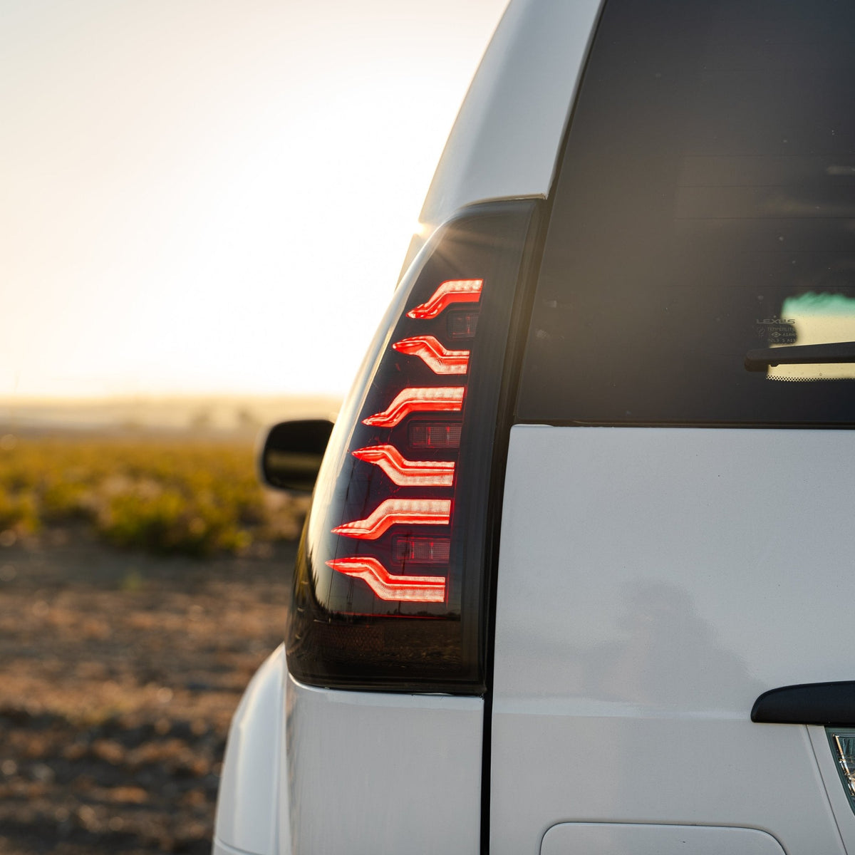AlphaRex 03-09 Lexus GX 470 LUXX-Series LED Tail Lights Black Smoke