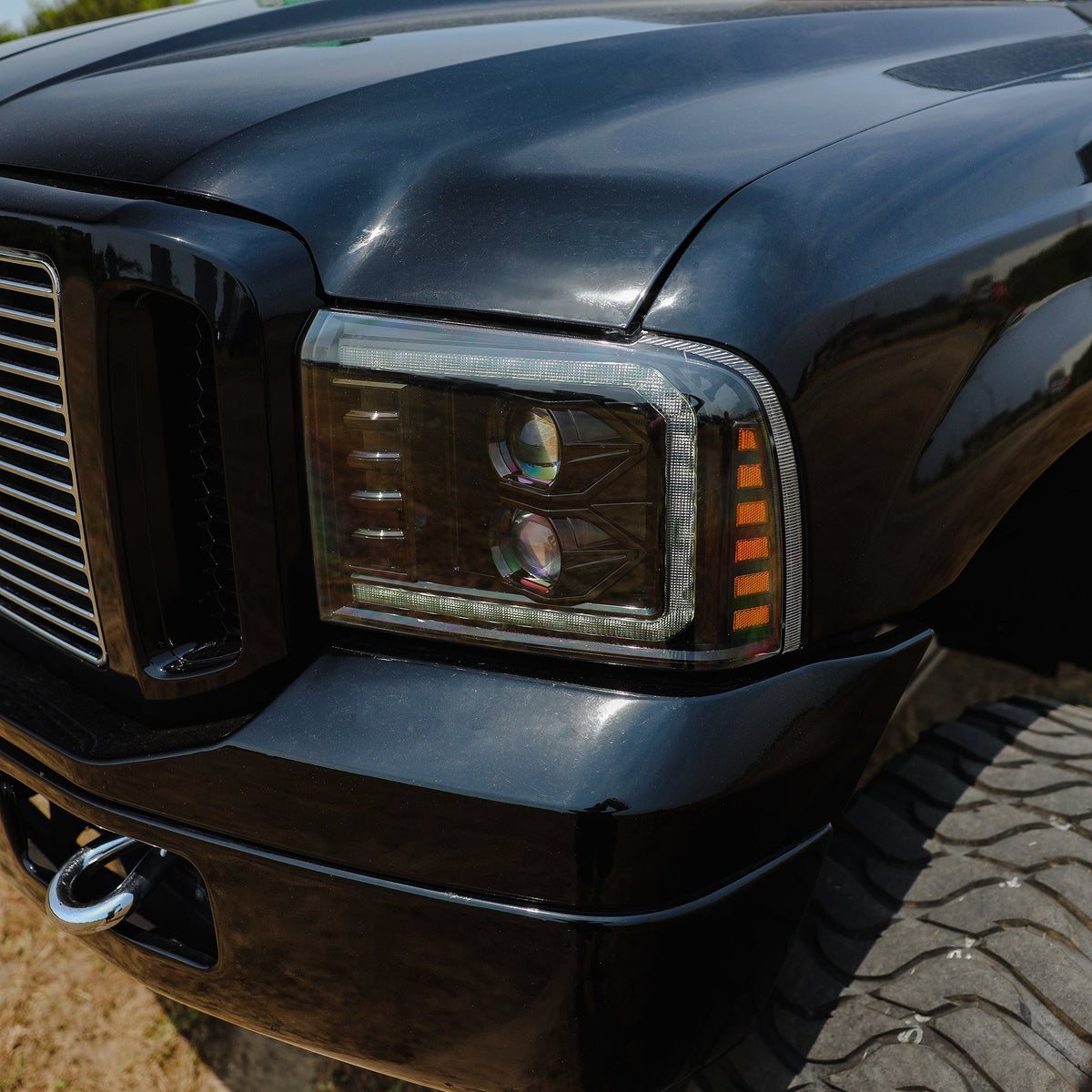 AlphaRex 05-07 Ford Super Duty/Excursion PRO-Series Halogen Projector Headlights Black