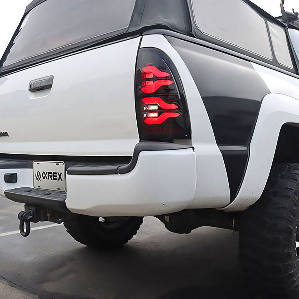 AlphaRex 05-15 Toyota Tacoma LUXX-Series LED Tail Lights Black Smoke