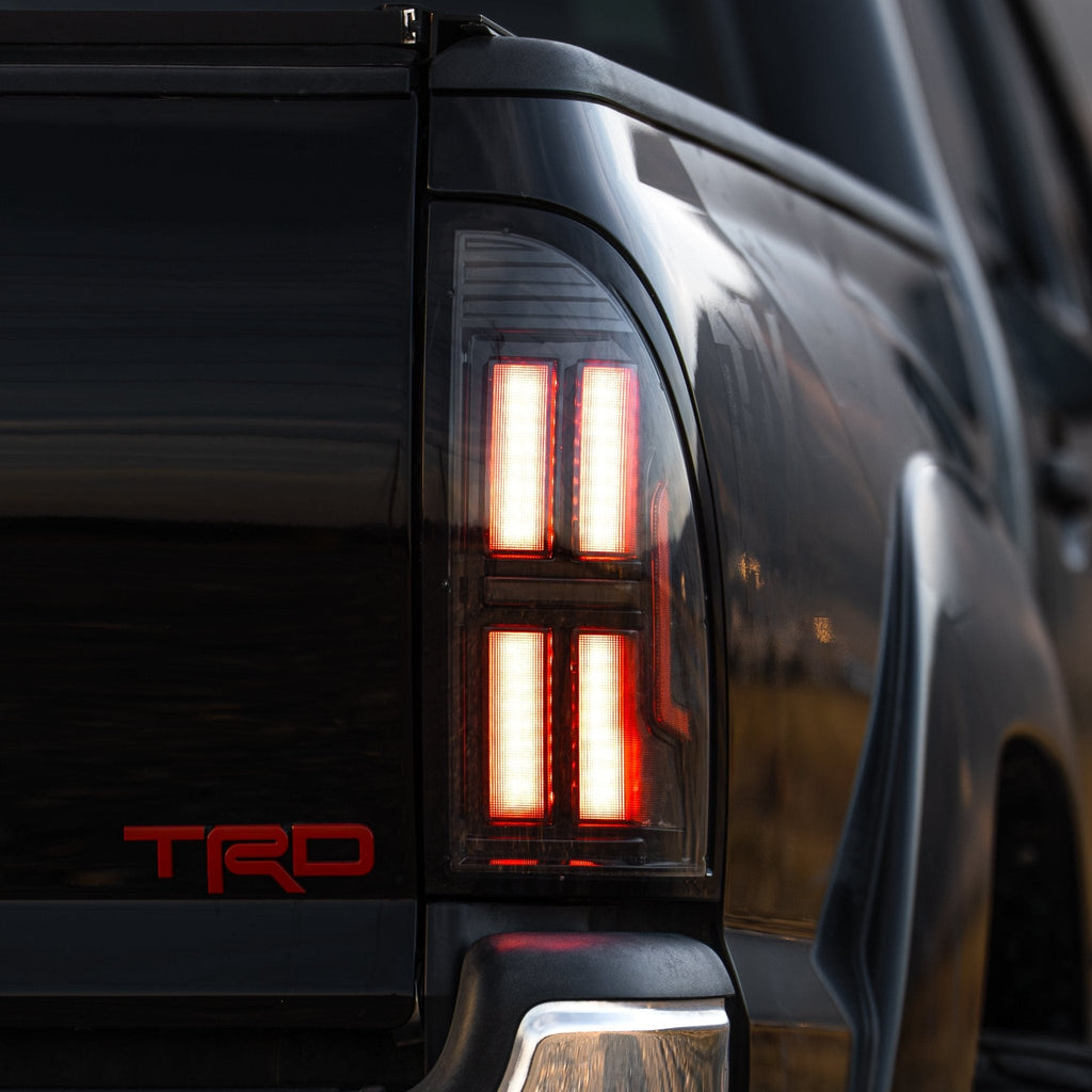 AlphaRex 05-15 Toyota Tacoma NOVA-Series Prismatic LED Tail Lights Black Smoke