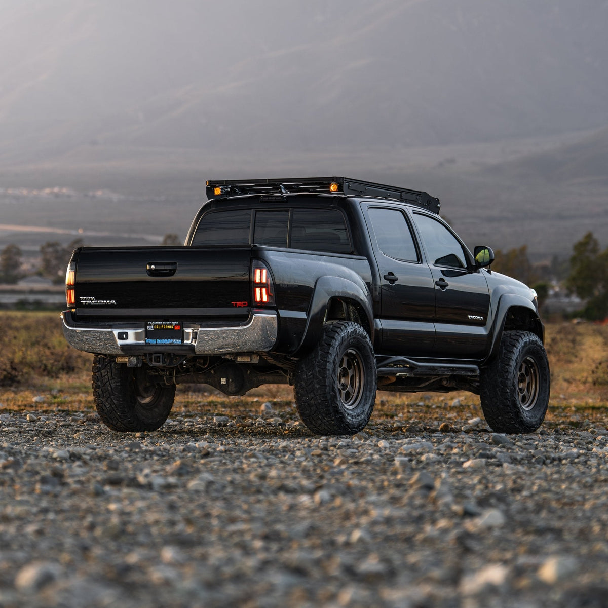 AlphaRex 05-15 Toyota Tacoma NOVA-Series Prismatic LED Tail Lights Black Smoke