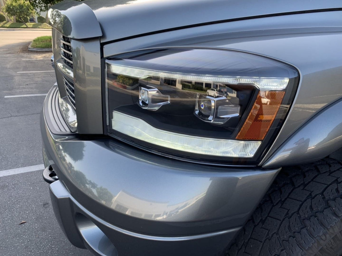 AlphaRex 06-08 Dodge Ram PRO-Series Halogen Projector Headlights Alpha-Black