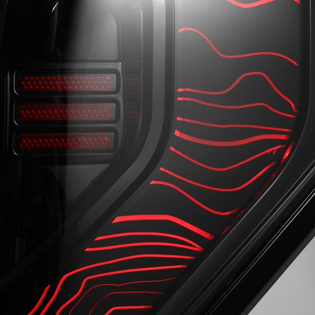 AlphaRex 10-24 Toyota 4Runner TOPO-ETCH NOVA-Series Prismatic LED Tail Lights Black Clear
