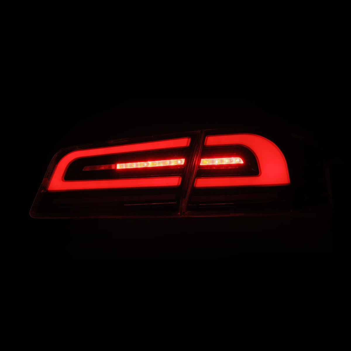AlphaRex 12-21 Tesla Model S LUXX-Series LED Tail Lights Black Clear (With Black Trunk Center Piece Replacement)