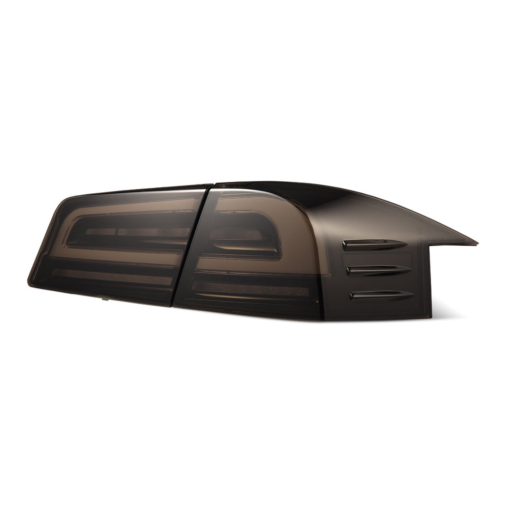 AlphaRex 12-21 Tesla Model S LUXX-Series LED Tail Lights Black Smoke (With Black Trunk Center Piece Replacement)