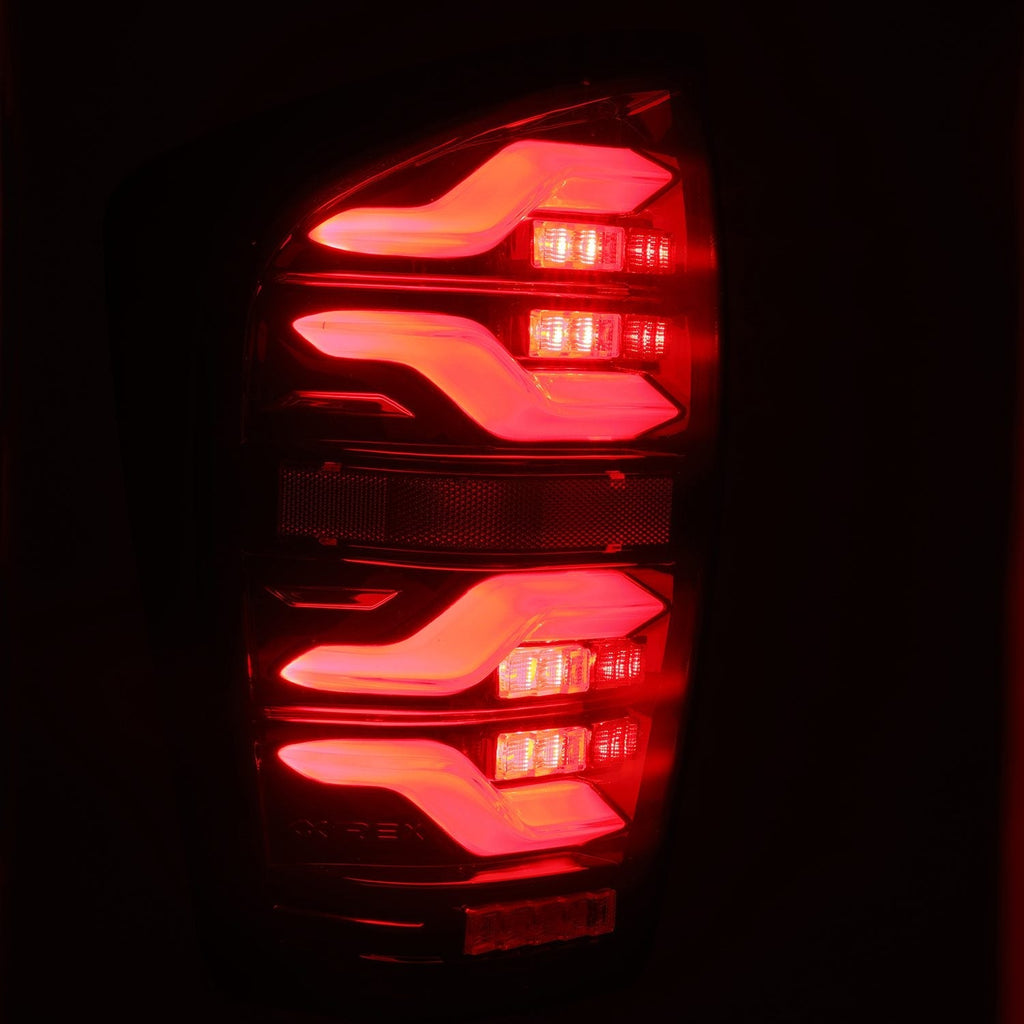 AlphaRex 16-23 Toyota Tacoma LUXX-Series LED Tail Lights Black-Red