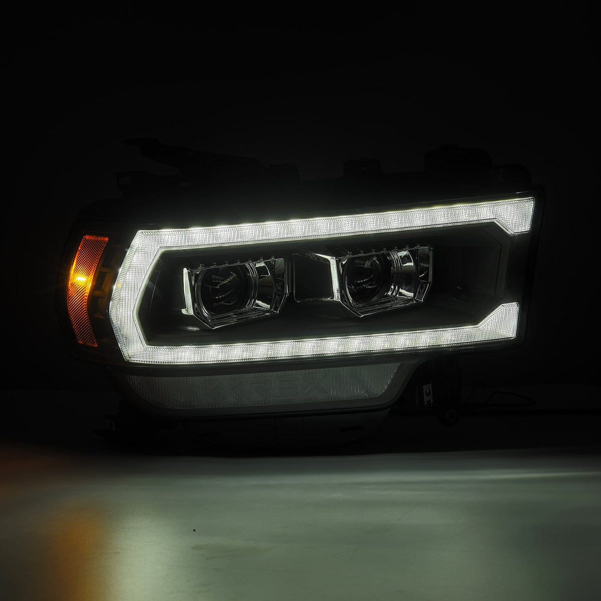 AlphaRex 19-24 Ram 2500/3500/4500/5500 PRO-Series Halogen Projector Headlights Black