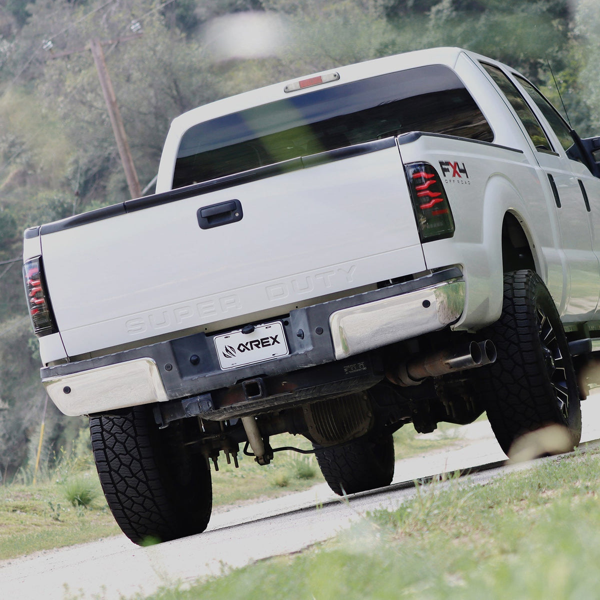 AlphaRex 99-16 Ford Super Duty / 97-03 F150 LUXX-Series LED Tail Lights Black Smoke