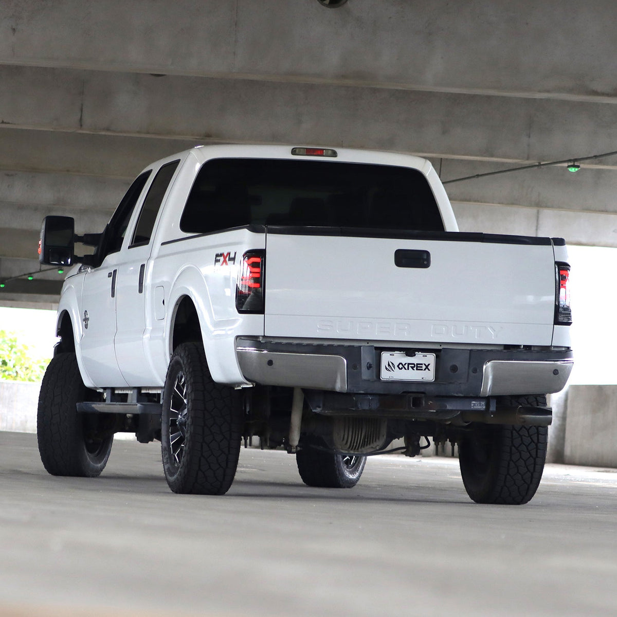AlphaRex 99-16 Ford Super Duty / 97-03 F150 LUXX-Series LED Tail Lights Black-Red
