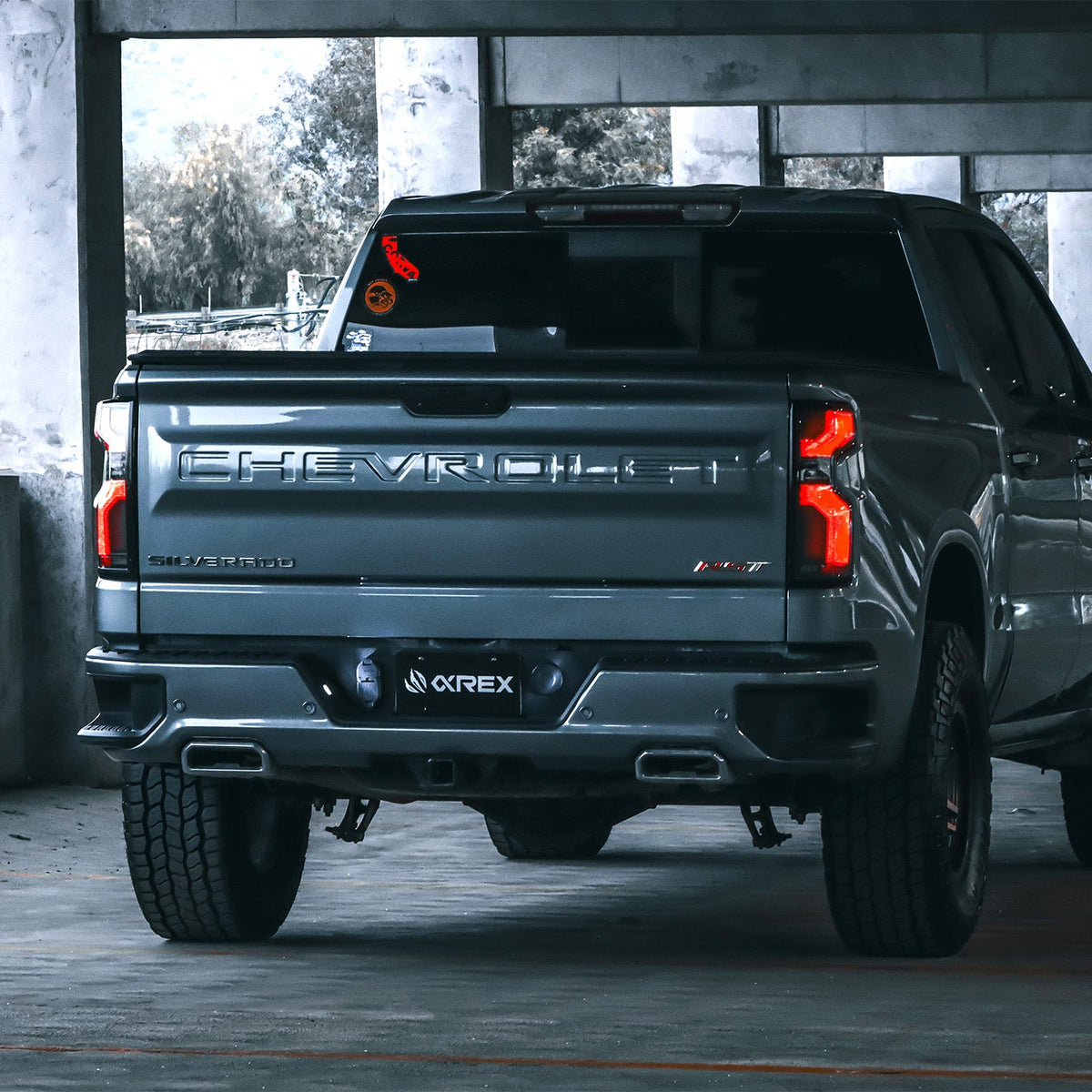 AlphaRex 19-26 Chevrolet Silverado 1500 / 20-26 Silverado 2500HD/3500HD LUXX-Series LED Tail Lights Black-Red