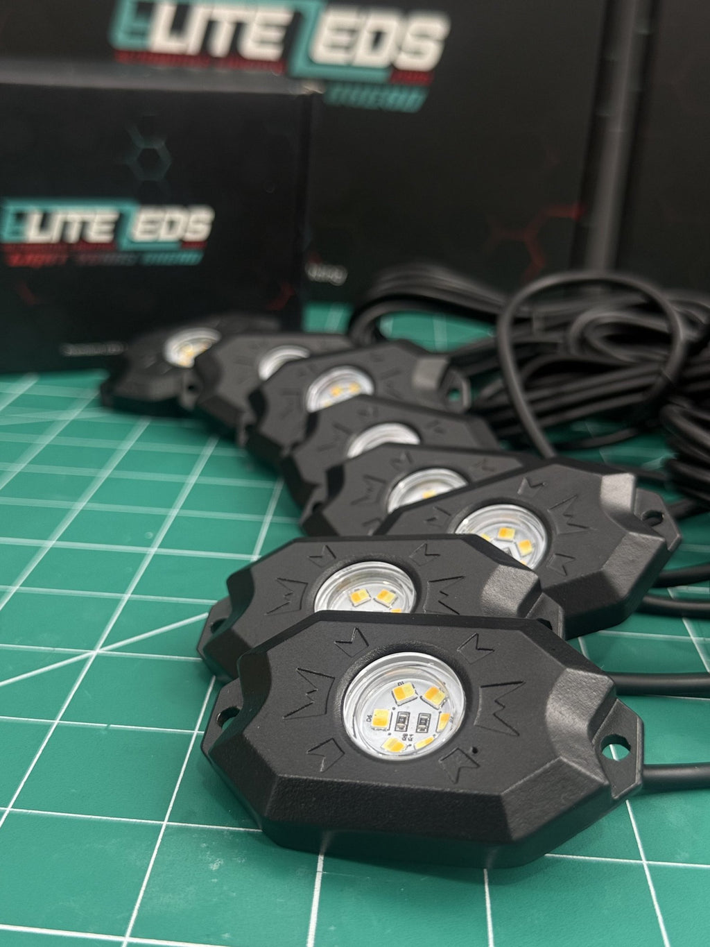 White rock light pods with Elite LEDs packaging showing die-cast aluminum housing