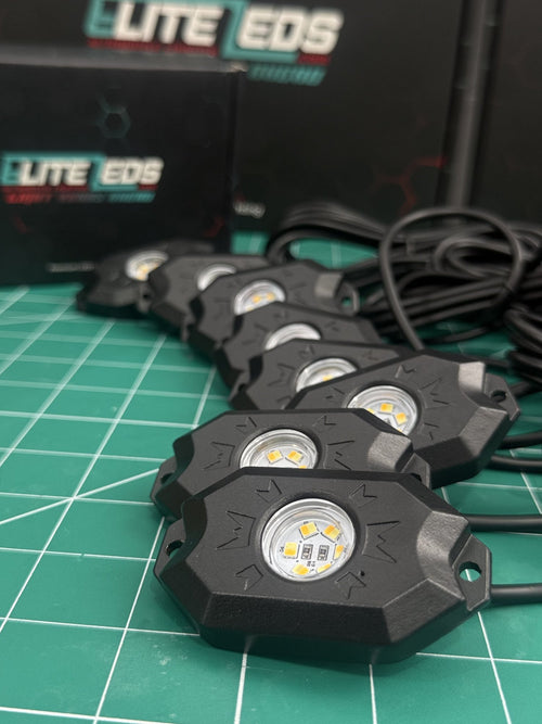 White rock light pods with Elite LEDs packaging showing die-cast aluminum housing