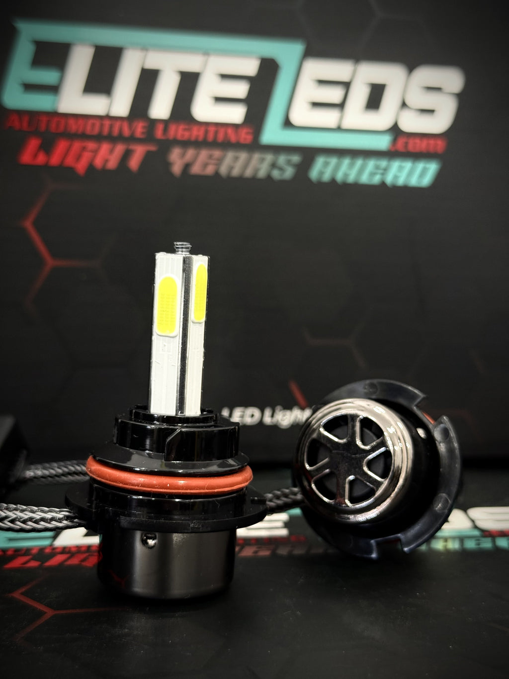 R7 4-sided COB LED headlight bulb close-up showing braided heatsink design