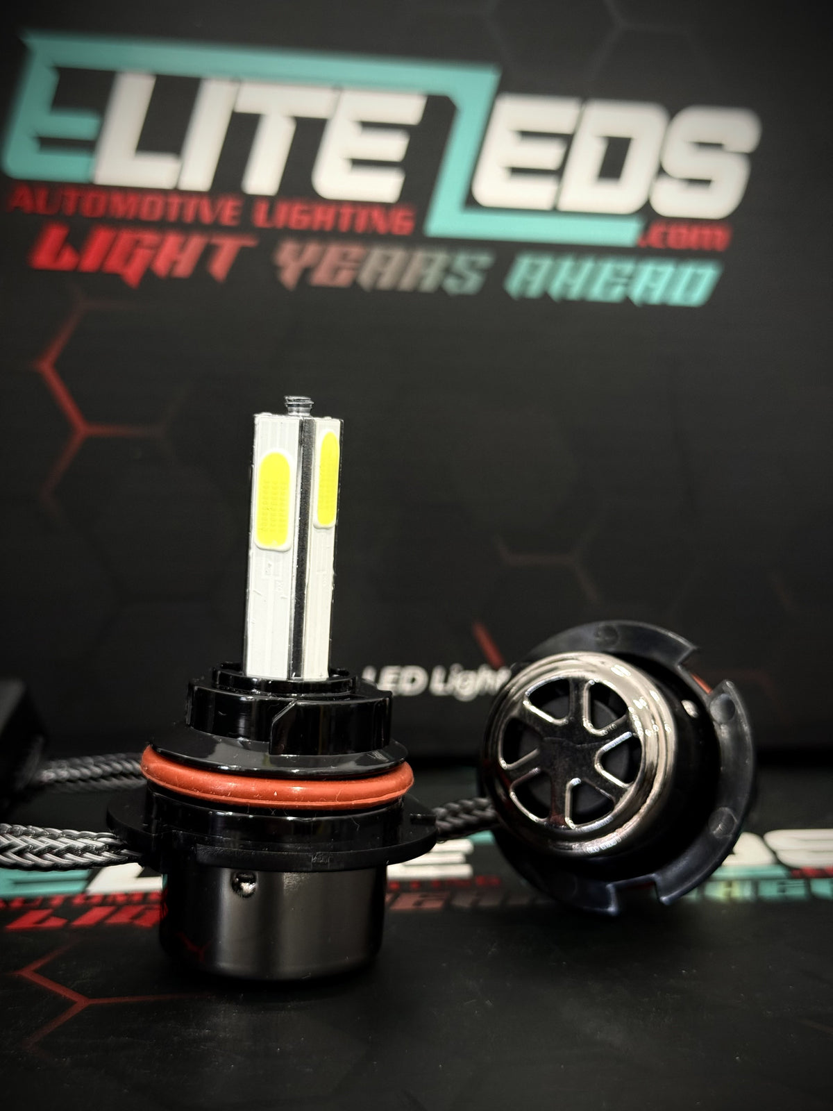 R7 4-sided COB LED headlight bulb close-up showing braided heatsink design