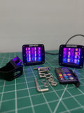 2-piece 24W RGB chase LED pod lights showing purple chase mode with remote and hardware